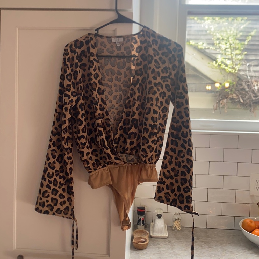 TOBI cheetah print body suit, worn once, great condition, size: XS
